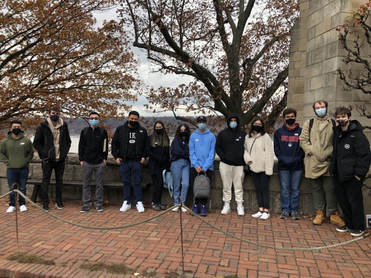 Group of students standing for a picture in front of The Met Cloisters museum